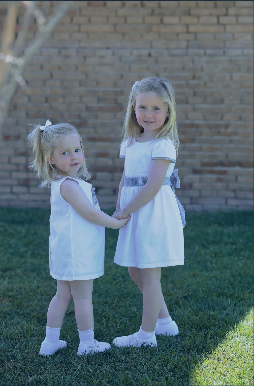 RAPIFE GIRLS WHITE DRESS WITH NAVY GINGHAM BOW DETAIL 5115C26