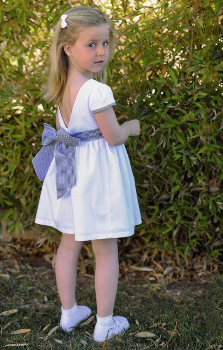 RAPIFE GIRLS WHITE DRESS WITH NAVY GINGHAM BOW DETAIL 5115C26