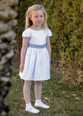 RAPIFE GIRLS WHITE DRESS WITH NAVY GINGHAM BOW DETAIL 5115C26