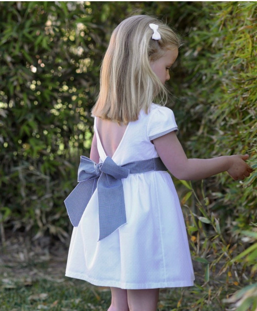 RAPIFE GIRLS WHITE DRESS WITH NAVY GINGHAM BOW DETAIL 5115C26